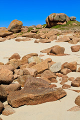 Fototapeta na wymiar Granite boulders on french atlantic coast beach, Brittany