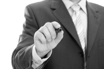 Businessman holding a pen