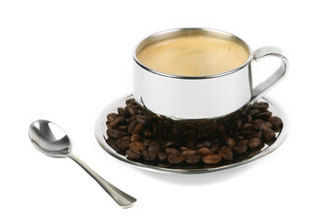 metal Cup of espresso coffee with spoon and seeds