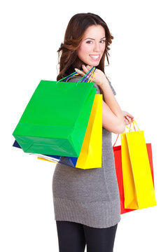junge brünette Frau mit Einkaufstaschen
