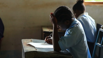 Boys and girls in a school in Kenya. - Powered by Adobe
