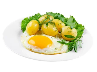 Fotobehang Spiegeleieren Fried egg with potato