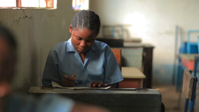 Students Taking An Exam In School In Kenya.