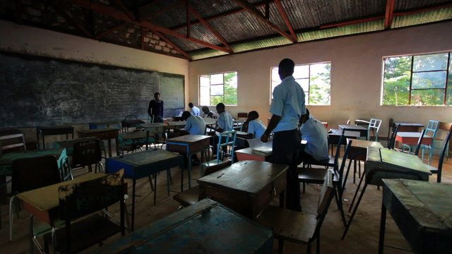 Classroom taking a test in a village in Kenya.