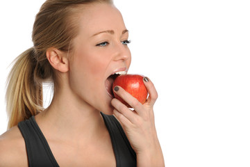 Young Woman Eating Red Apple