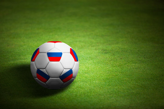 Flag of Russia with soccer ball over grass