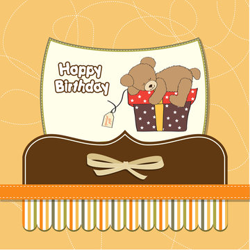 birthday greeting card with teddy bear and big gift box