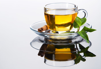 Tea cup with fresh mint leaves