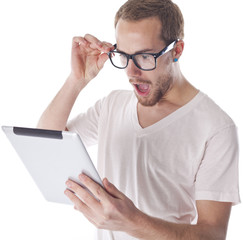 Good Looking Smart Man Looking On Tablet Computer