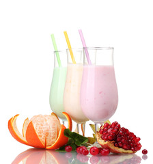 Milk shakes with fruits isolated on white