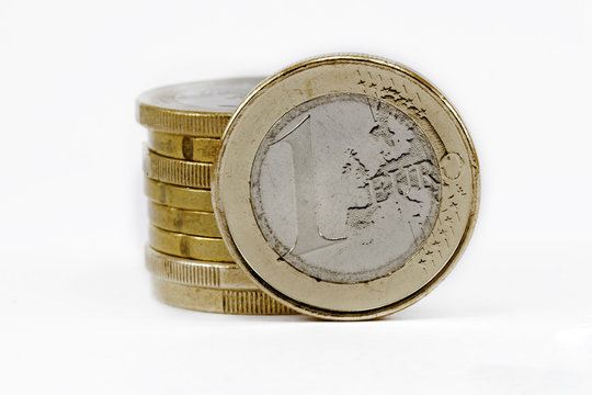 two coins euros stacks