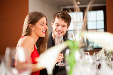 Couple Celebrating an Occasion in Restaurant