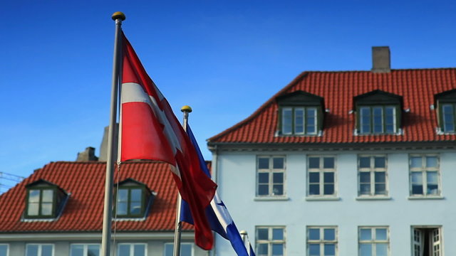 Flags blowing in the wind in Copenhagen, Denmark.