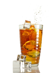 Ice tea with splash in glass