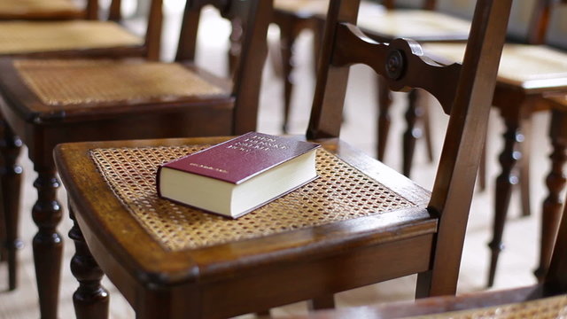 Bilbe on rows of chairs in a church in Copenhagen, Denmark Europe.