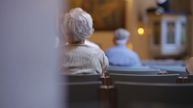 People in a church in Copenhagen, Denmark.