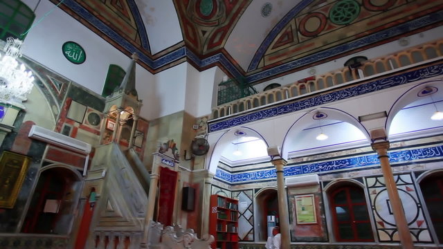Stock Video Footage of a man in the Jezzar Pasha Mosque in Israel.