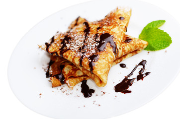 French crepes with chocolate syrup