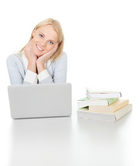 Beautiful student girl studying with laptop