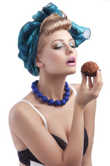 blond young girl longing to eat a sweet