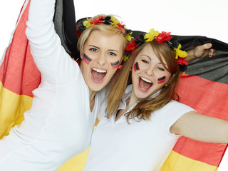 Two girly soccer fans having a party