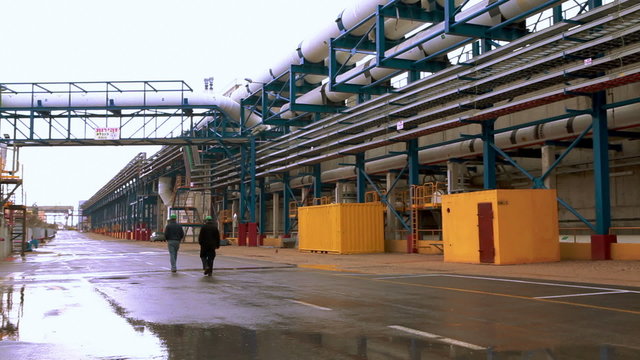 Stock Video Footage of two workers at a desalination plant in Israel.
