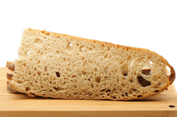 The cut bread on a chopping board