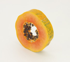 Papaya fruit sliced through the middle