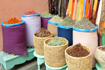 Colorful spices in bags at market