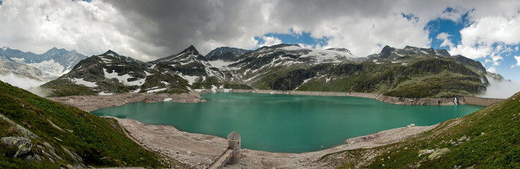 Alps near Wei&sect;see with fog in Uttendorf