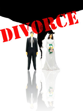 wedding couple figures and ripped paper (divorce concept)