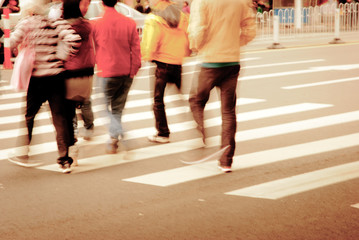 people on zebra crossing street