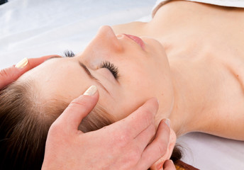 Fototapeta na wymiar woman receiving facial massage