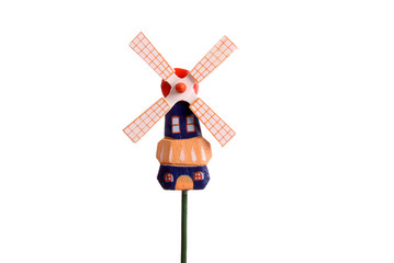 Little Dutch windmill against a white background