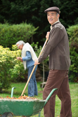 Elderly couple in their garden