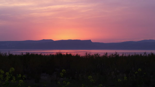 Stock Video Footage of the Sea of Galilee at sunset shot in Israel at 4k with Red.