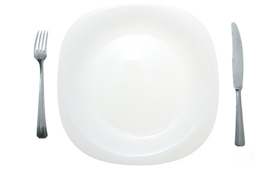 Cutlery and white plate