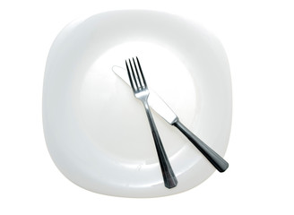 Cutlery and white plate