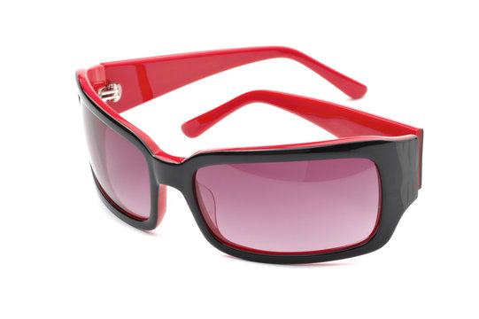red and black sunglasses isolated on white