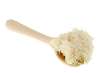 cooked rice on a wooden spoon