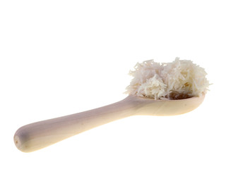 cooked rice on a wooden spoon