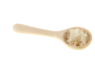 cooked rice on a wooden spoon