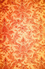 Red flower pattern on the wall