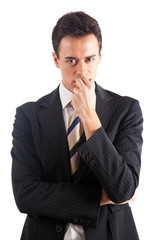 Thoughtful businessman isolated on white