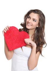 Young brunette holding a big love sign