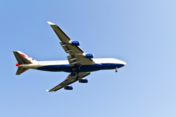 White air plane flying in the sky