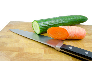 cucumber and carrot on chopping board