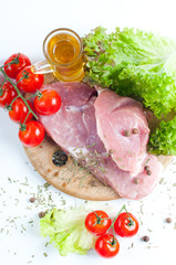 meat, tomatoes and a salad