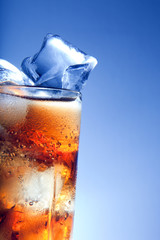 A fresh glass of cola with ice
