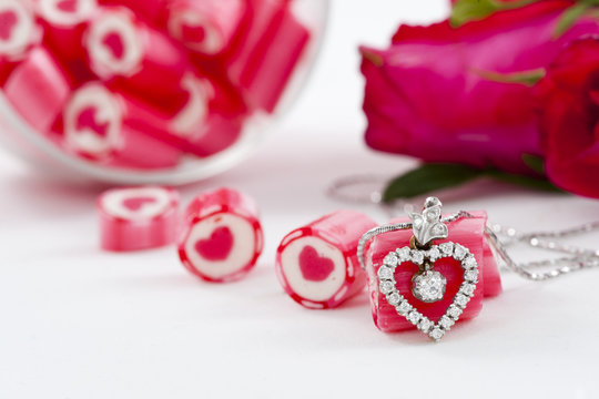 Diamond pendant and candy with rose